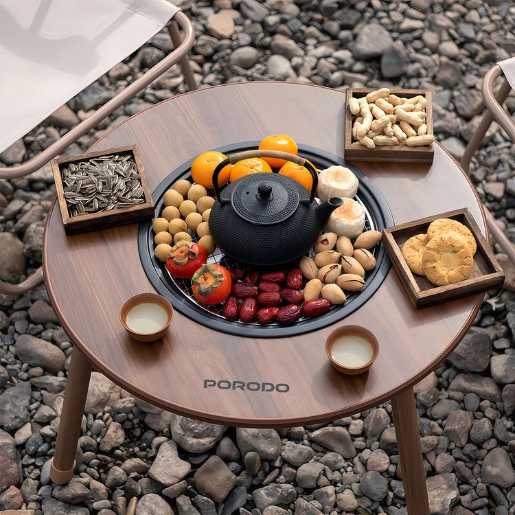 طاولة شواء خارجية دائرية من Porodo مع حلقة حماية من الحرارة، ووعاء فحم قابل للإزالة، مصنوعة من الفولاذ الكربوني - لون بني