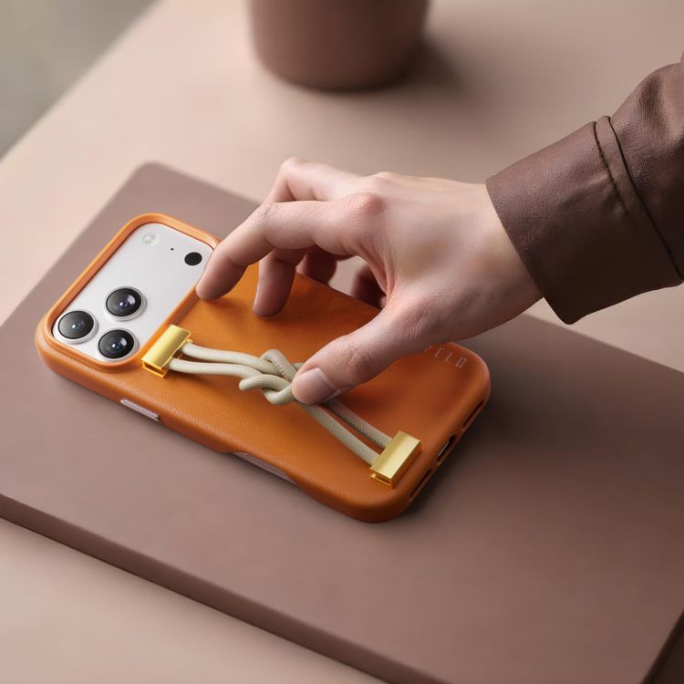 Levelo Polaris PU Leather Case with Wrist-Strap Grip for iPhone 17 Pro Max, Microfiber Inner Lining, Raised Bezels for Camera & Screen, Shock-Resistant Bumper, Drop-Tested - Orange