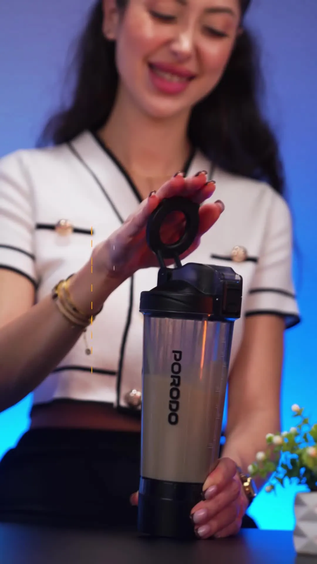 Porodo Lifestyle Grip & Mix Protein Shaker Bottle with Magnetic Phone Holder, 700mL Capacity, Powerful Shaking Function, Long Battery Life, BPA-Free, 7500 RPM Motor Speed, 600mAh Battery Capacity - Black