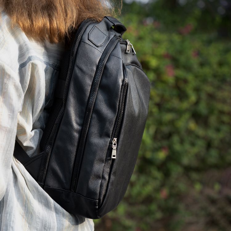 Levelo Elegancia Universal 16" Backpack with LVL Signature Logo, Leather Material, Water Resistant, Multiple Pockets - Black