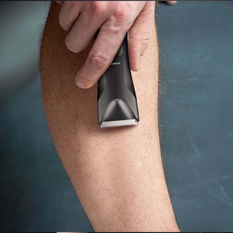 Porodo Lifestyle Full-Body Grooming Kit for Beard, Hair & Body, Dual Speed Control, 2 Comb Heads, 5W Rated Power, 600mAh Battery Capacity, 1.5 Hours Working Time, USB-C & Charging Base Charging Interface, IPX7 Water Resistance Level, Ceramic Blades Material, Wet & Dry Shaving - Black