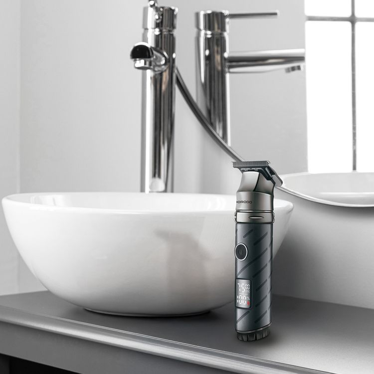 Porodo Lifestyle Edgemaster T-Blade Trimmer & Shaver with Display & 4 Comb Heads, 5W Rated Power, 2000mAh Battery Capacity, 7000RPM Motor Speed, 4 Hours Working Time, USB-C Charging Port, Zinc Alloy Material, Corrosion-Free Ceramic Blades, Dual Speed Control, Consistent & Powerful Torque - Black