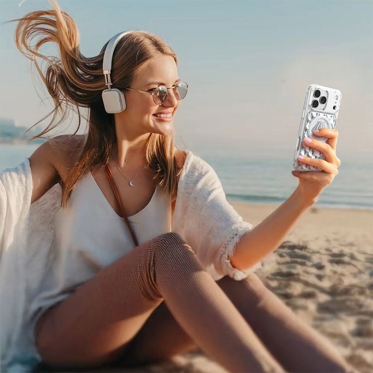 حافظة Levelo Pearl ثلاثية الأبعاد المحيط لجهاز iPhone 17 Pro، بتصميم حجر القمر ثلاثي الأبعاد، متوافقة مع MagSafe ومزودة بمغناطيس قوي، حواف مرتفعة لحماية الكاميرا والشاشة، مختبرة ضد السقوط، زوايا ممتصة للصدمات بتصميم يشبه الوسادة الهوائية، بأناقة مستوحاة من المحيط - متلألئة.