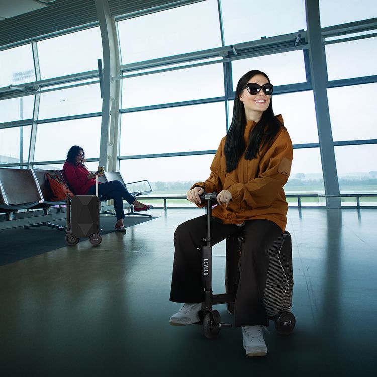 Levelo Spark-E Portable E-Scooter Luggage with Smooth-Rolling Wheels , Ultra-Light Carbon Fiber Construction, TSA Lock, Smart Telescopic Handle, Effortless Travel, Reverse gear, 250W Motor Power, 20L Luggage Capacity,  110kg Max User Weight - Black