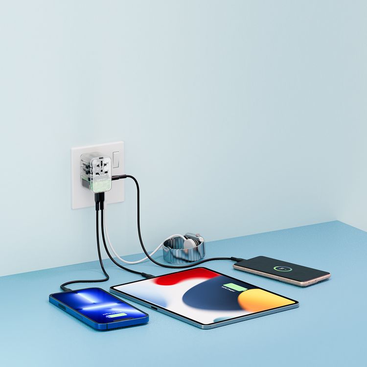 Powerology Universal Multi-Port Travel Adapter with 65W Power Delivery, Dual 10A Fuses, 12W USB-A Output, Laptop Charging Compatibility, Universal Plugs - Transparent